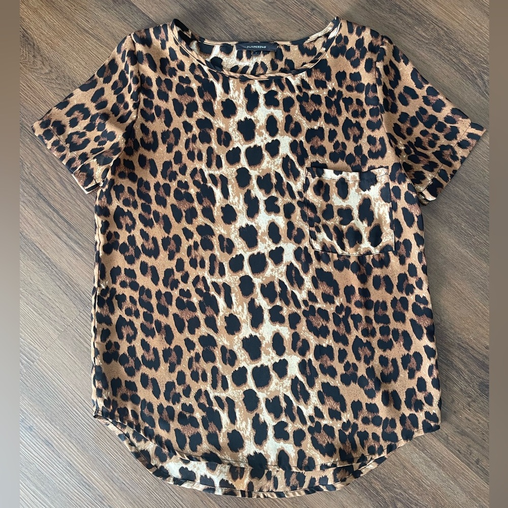 Oliviaceous leopard print top - subtly sheer - with pocket.